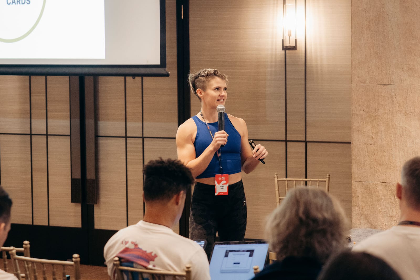 Jodie speaking on stage to audience